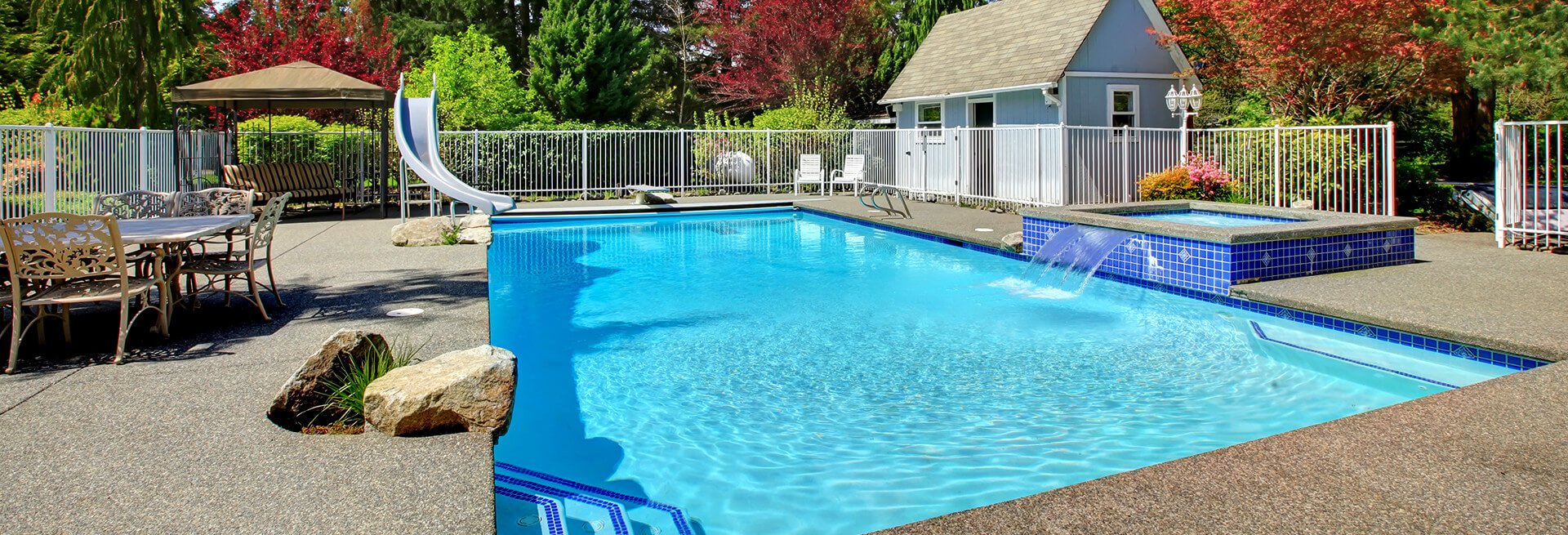 pool and spa in a fort myers backyard that received pool leak repair from american leak detection of southwest florida